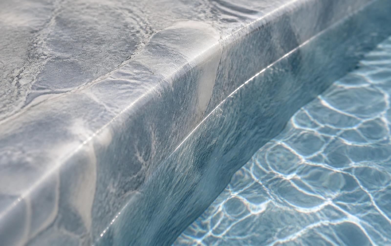 Macro detail of a marble-effect reinforced PVC pool membrane at the waterline